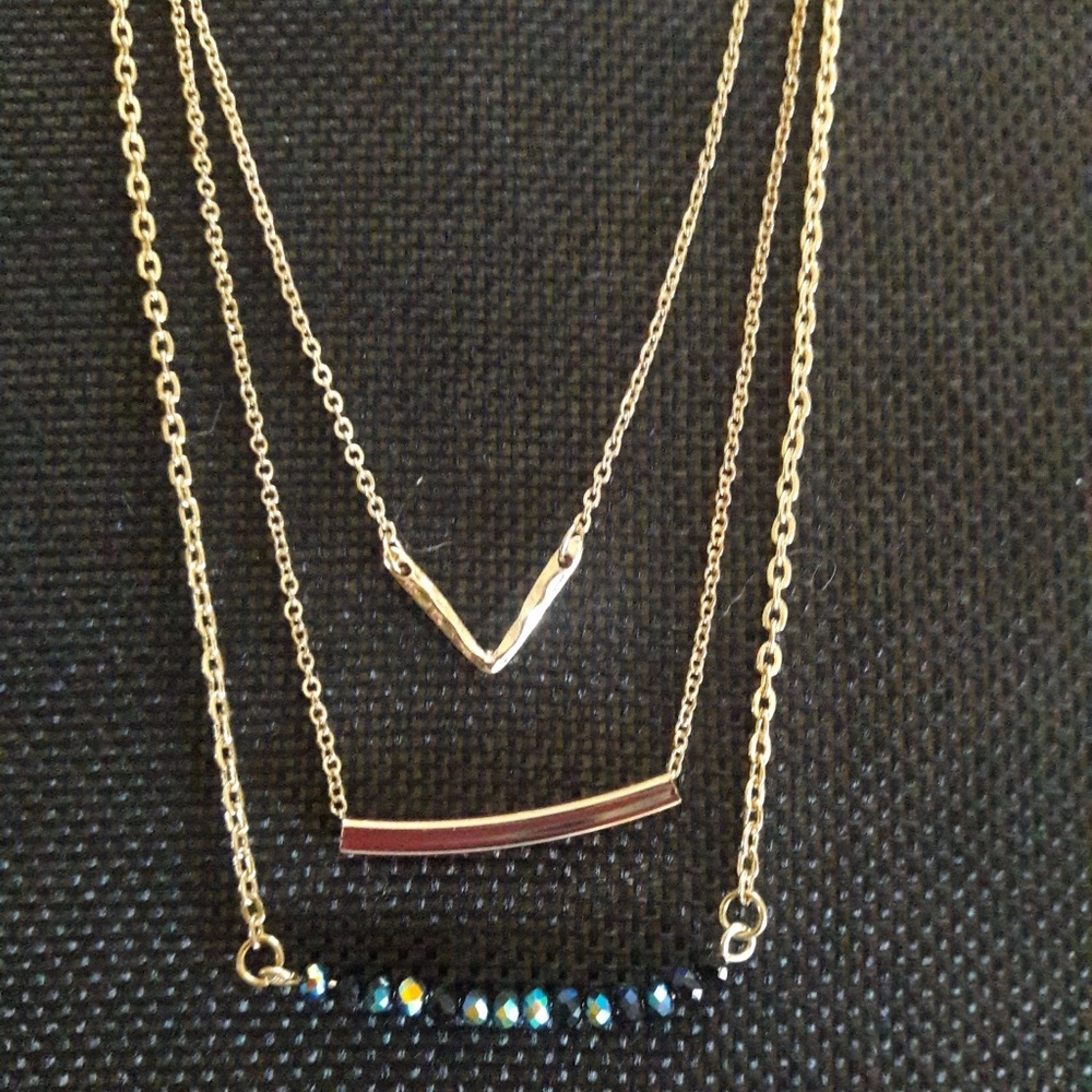 Three strand gold tone with green beads (2)